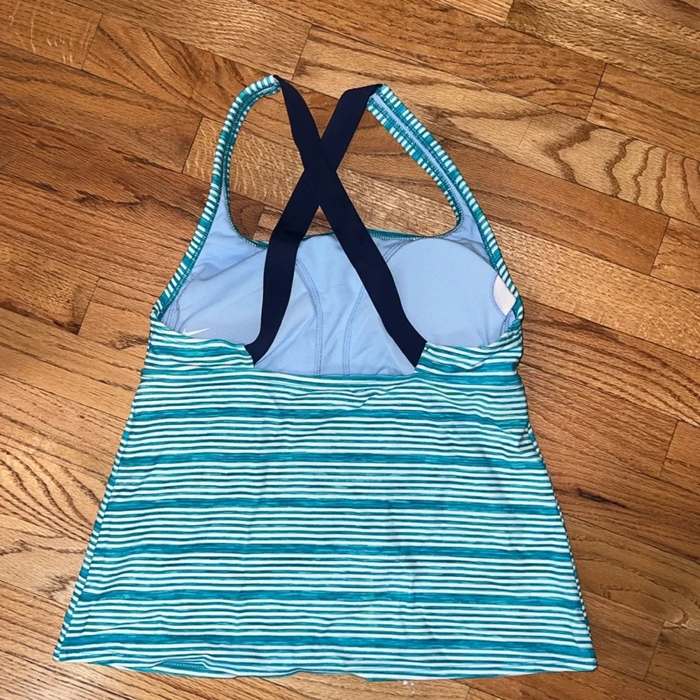 Women’s‎ Nike, green and white stripe swim top.  Medium
